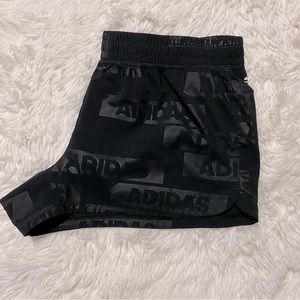 Adidas running shorts.